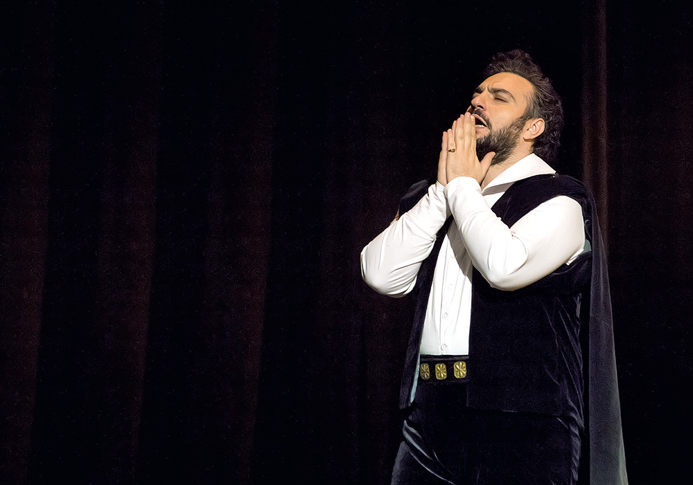 man prays-singer-opera